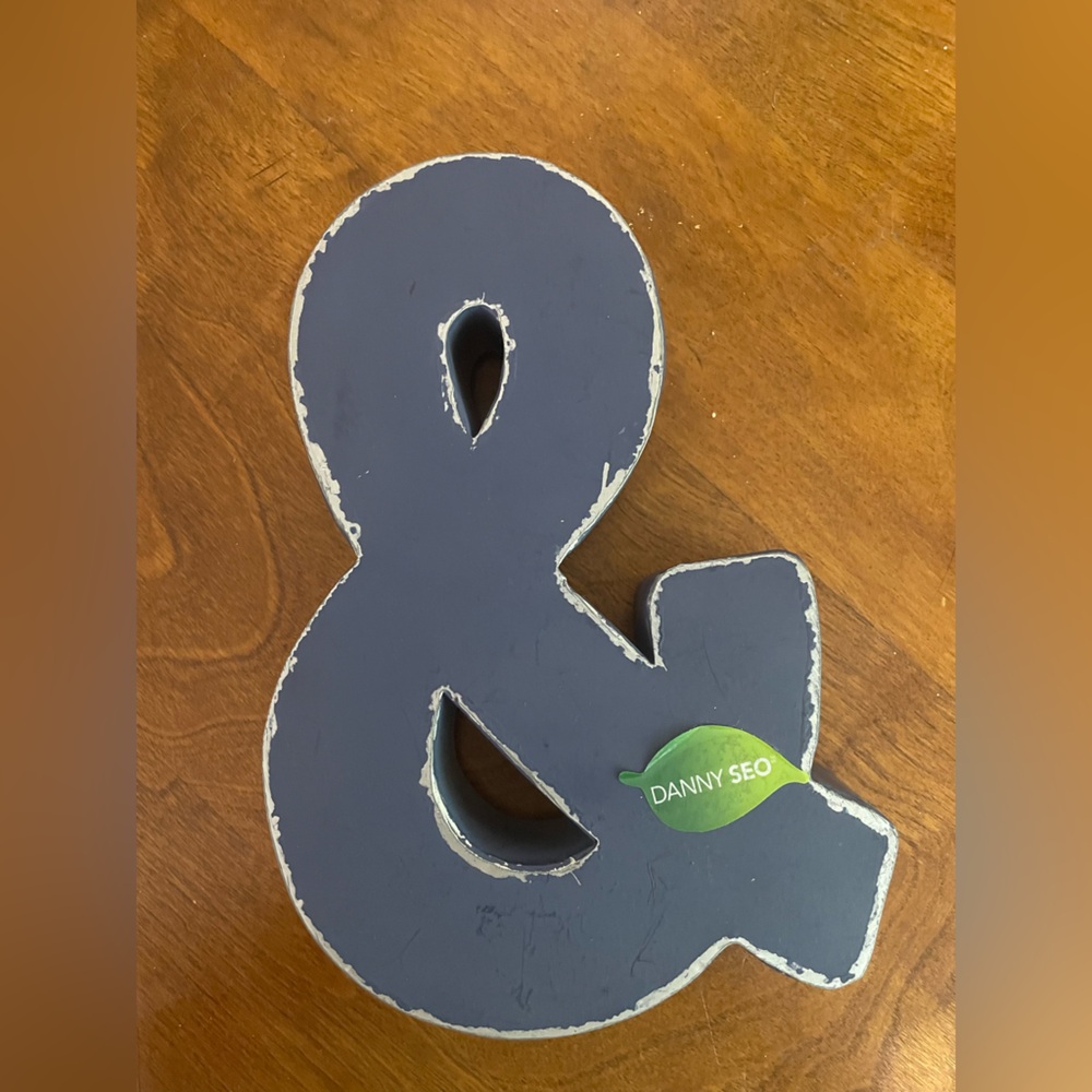 Metal & ampersand sign